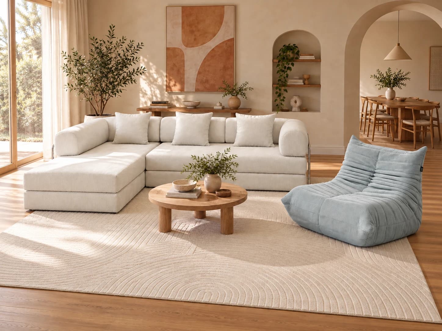Nesto sofa, Caterpillar chair and washable rug in a furnished living room